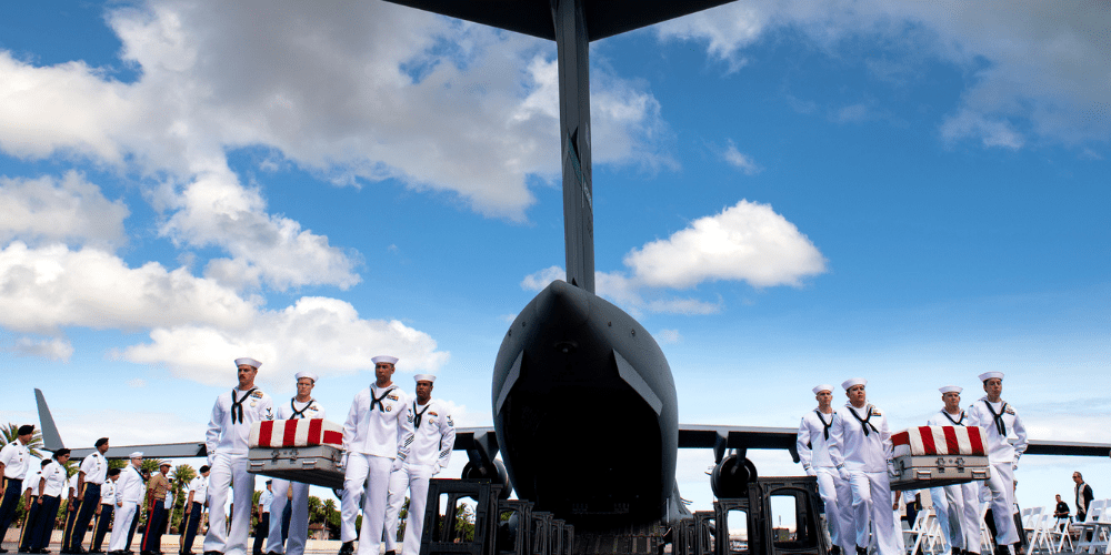 DPAA hosts honorable carry as the remains of Unidentified USS Oklahoma Sailors and Marines return to Hawaii.